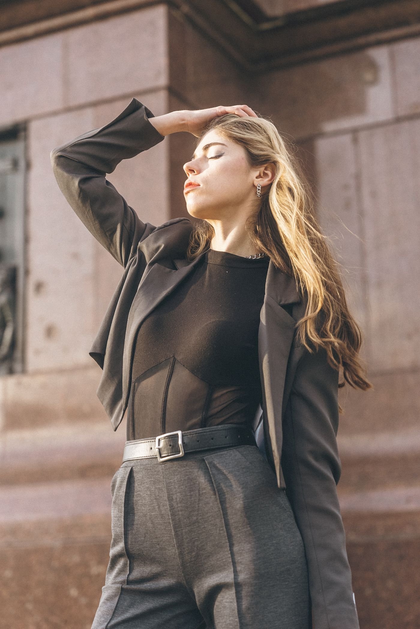 Grey pleated trousers with a blazer